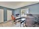 Spacious office with two desks, a large window, and ample workspace at 110 114Th Ne Ter # 110, St Petersburg, FL 33716