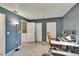 Bright office with white desks, neutral carpet, and a window for natural light at 110 114Th Ne Ter # 110, St Petersburg, FL 33716