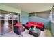 Relaxing screened patio featuring tile floors, comfortable seating, and views to the outside at 110 114Th Ne Ter # 110, St Petersburg, FL 33716
