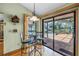 Cozy breakfast nook with views of the screened-in pool and outdoor area at 11250 Tradewinds Blvd, Largo, FL 33773