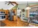 Kitchen with an open plan, stainless steel appliances, breakfast bar and view to the outside patio at 11250 Tradewinds Blvd, Largo, FL 33773