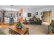 Open-concept living space with dining area and comfortable seating, perfect for gatherings at 11250 Tradewinds Blvd, Largo, FL 33773