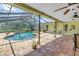 Relaxing outdoor pool area with comfortable seating, perfect for entertaining guests at 11250 Tradewinds Blvd, Largo, FL 33773