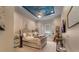 A whimsical bedroom featuring a custom painted ceiling and comfortable seating in the bay window at 12125 Stonelake Ranch Blvd, Thonotosassa, FL 33592