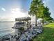 Waterfront home featuring private dock with boat lift and sun deck at 12125 Stonelake Ranch Blvd, Thonotosassa, FL 33592
