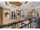 View of the grand foyer with wrought iron railings and detailed trim at 12125 Stonelake Ranch Blvd, Thonotosassa, FL 33592