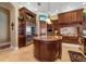 Chef's kitchen featuring a custom island, professional appliances, and ample counter space at 12125 Stonelake Ranch Blvd, Thonotosassa, FL 33592