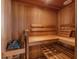 A home cedar sauna offering a tranquil space for relaxation and wellness with multi-tier seating at 12125 Stonelake Ranch Blvd, Thonotosassa, FL 33592