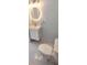 Contemporary bathroom featuring modern fixtures, a sleek vanity, updated lighting, and a low-flow toilet at 1407 Coral Ridge Dr, Punta Gorda, FL 33950