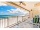 Enjoy beautiful ocean views from the balcony with seating, perfect for relaxing and soaking in the coastal scenery at 17720 Gulf Blvd # A702, Redington Shores, FL 33708