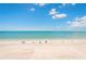 Scenic beach view with turquoise water and a sandy shore on a sunny day at 17720 Gulf Blvd # A702, Redington Shores, FL 33708