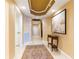 Entry hallway with tiled floors, elegant rug, recessed lighting, and art at 17720 Gulf Blvd # A702, Redington Shores, FL 33708