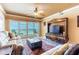 Cozy living room with comfortable seating, ocean views from sliding doors, and stylish decor, perfect for relaxation at 17720 Gulf Blvd # A702, Redington Shores, FL 33708