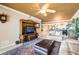 Cozy living room with comfortable seating, ocean views from sliding doors, and stylish decor, perfect for relaxation at 17720 Gulf Blvd # A702, Redington Shores, FL 33708