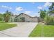 Charming single-story home featuring a well-manicured lawn and a private, attached single car garage at 1811 49Th N St, St Petersburg, FL 33710
