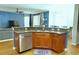 Bright kitchen with granite countertops, stainless steel appliances, and breakfast bar at 18439 Red Willow Way, Land O Lakes, FL 34638