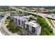 An aerial view of the condo community surrounded by lush greenery with easy highway access at 201 W Laurel St # 308, Tampa, FL 33602