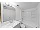 Bathroom featuring vanity, mirror, and combined toilet and shower/tub at 201 W Laurel St # 308, Tampa, FL 33602