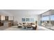 Bright living room with sleek modern finishes, open floor plan, floor-to-ceiling windows, and scenic views at 235 1St S Ave # 3104, St Petersburg, FL 33701