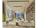 Modern condo lounge with floor-to-ceiling windows, stylish seating, and a bookcase, offering an elegant space at 235 1St S Ave # 3104, St Petersburg, FL 33701