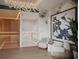 Relaxing spa area featuring a sauna, art, chairs, and hardwood floors at 235 1St S Ave # 3104, St Petersburg, FL 33701