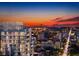 Expansive city view at twilight showcasing a modern high-rise residential building with private balconies and nearby downtown attractions at 235 1St S Ave # 3708, St Petersburg, FL 33701