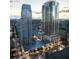 Aerial view of urban condo complex and city with restaurants and storefronts; near the bay at 235 1St S Ave # 3708, St Petersburg, FL 33701