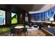 Entertainment room with pool table, golf simulator, and a comfortable seating area at 235 1St S Ave # 3708, St Petersburg, FL 33701