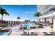 Rooftop pool surrounded by lounge chairs with clear skies, offering a luxurious outdoor experience at 235 1St S Ave # 3708, St Petersburg, FL 33701