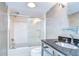 Bathroom with granite counters, a glass enclosed shower, and modern finishes at 2413 Bayshore Blvd # 1903, Tampa, FL 33629