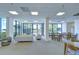 Spacious common area with seating, dining tables, large windows, and beautiful views of the surrounding landscape at 2413 Bayshore Blvd # 1903, Tampa, FL 33629