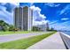 Stunning exterior view of a high-rise building and the community with beautiful landscaping and waterfront access at 2413 Bayshore Blvd # 1903, Tampa, FL 33629