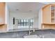Bright kitchen showcasing views of city and harbor, a breakfast bar, and stainless steel faucet at 2413 Bayshore Blvd # 1903, Tampa, FL 33629