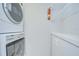Laundry area with stacked washer and dryer and storage at 2413 Bayshore Blvd # 1903, Tampa, FL 33629