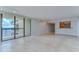 Bright living area with access to a balcony and breakfast bar looking into the kitchen at 2413 Bayshore Blvd # 1903, Tampa, FL 33629