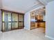 Bright living space with an adjoining kitchen featuring stainless steel appliances and tile flooring at 2413 Bayshore Blvd # 1903, Tampa, FL 33629