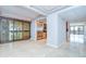 Open living space featuring tile floors, access to balcony, and stainless steel appliances at 2413 Bayshore Blvd # 1903, Tampa, FL 33629