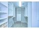 Walk-in closet featuring built-in shelving and drawers at 2413 Bayshore Blvd # 1903, Tampa, FL 33629
