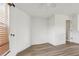 Bedroom with wood flooring, ceiling fan, and neutral wall color at 25737 Frith St, Land O Lakes, FL 34639