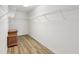 Walk-in closet with wood flooring and wire shelving at 25737 Frith St, Land O Lakes, FL 34639