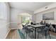 Elegant dining room with modern decor and a view of the backyard at 25737 Frith St, Land O Lakes, FL 34639
