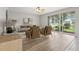 Bright living room with modern furnishings and scenic backyard views at 25737 Frith St, Land O Lakes, FL 34639