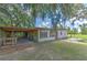 View of the garage, workshop and additional building at 2610 Crestview Rd, Wimauma, FL 33598