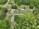 Aerial view of the home and its surroundings, showcasing the property's layout and ample space at 26223 Chianina Dr, Wesley Chapel, FL 33544