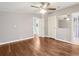 Large main bedroom features hardwood floors with ensuite bathroom and closet at 26223 Chianina Dr, Wesley Chapel, FL 33544
