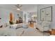 Cozy living room featuring an open concept and a dining space bathed in sunlight at 301 Kingston S St, St Petersburg, FL 33711