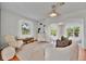Bright and spacious living room featuring hardwood floors, modern decor, and an open layout at 301 Kingston S St, St Petersburg, FL 33711