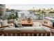 Relaxing covered deck overlooking the water, perfect for enjoying the outdoors at 322 Capri Blvd, Treasure Island, FL 33706