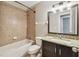 Bathroom featuring tiled shower and granite vanity top at 3530 Brook Crossing Dr, Brandon, FL 33511