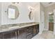 Bathroom with double vanity, granite countertops, and modern fixtures at 3530 Brook Crossing Dr, Brandon, FL 33511